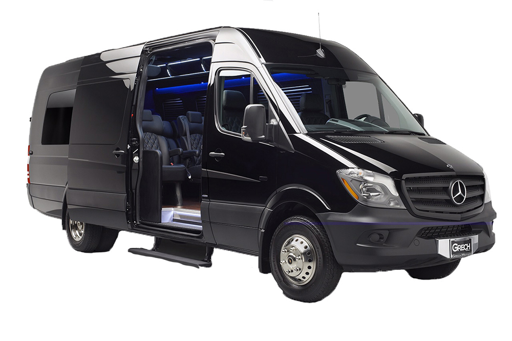 A black Sprinter with the side door open.